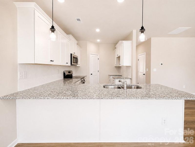 Furnished interior view inside a new home in , Charlotte (Image 10).