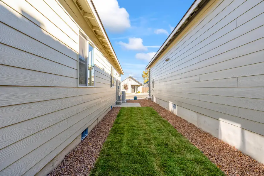 Exterior details and patio area of a home in Feather Ridge, Redmond (Image 17).
