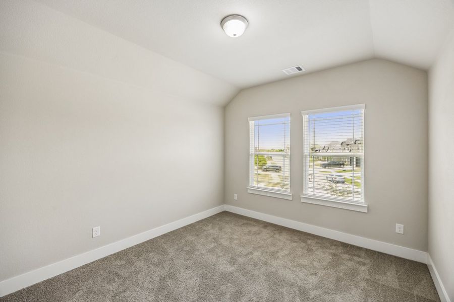 Representative unfurnished interior of a home built from the The Mockingbird by Lillian Custom Homes in Polo Ridge, Forney (Image 45).