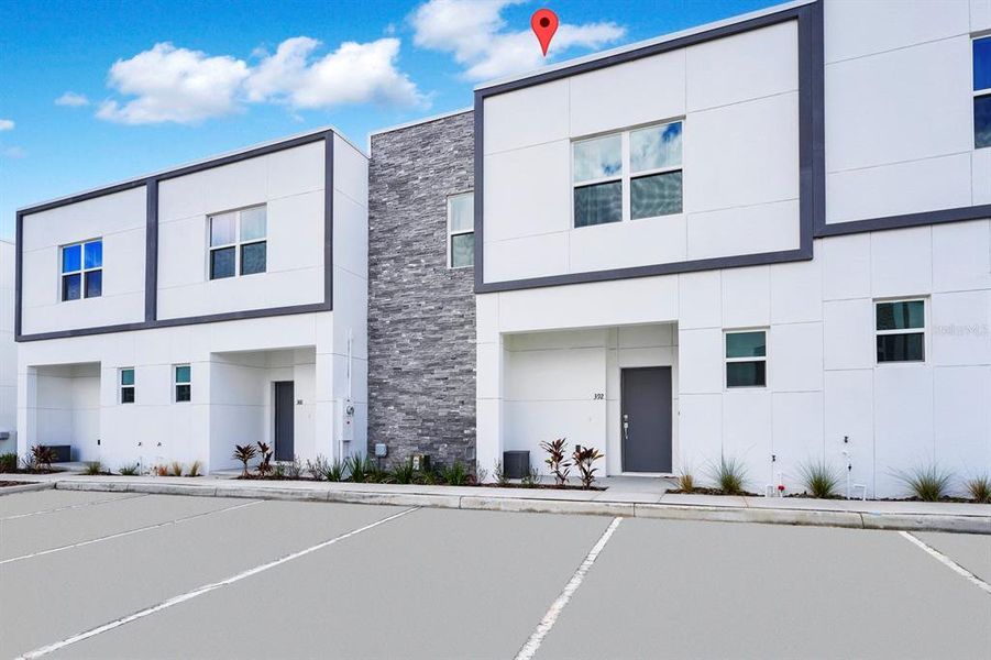 Front exterior of a new home in , Davenport, FL, highlighting curb appeal (Image 1).