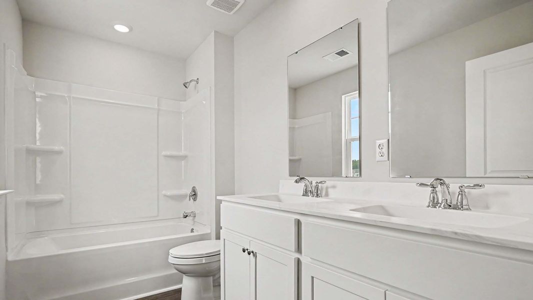 Furnished interior view inside a new home in Sandridge Park, Little River (Image 7).