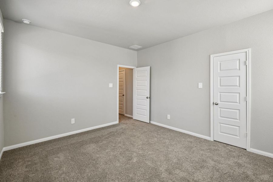 Spacious, unfurnished interior of a new home in Spring Brook Village - Luxe Series, Houston (Image 34).