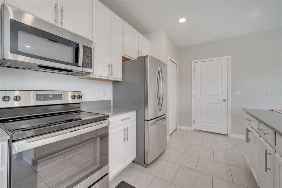 Furnished interior view inside a new home in Cypress Park Estates, Haines City (Image 17).