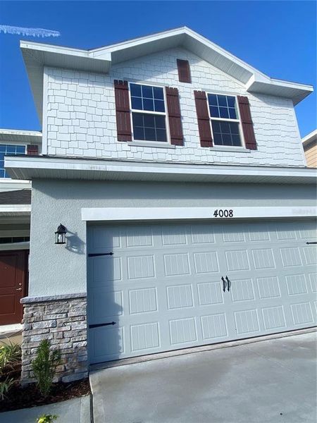 Exterior details and patio area of a home in Harmony Central, Harmony (Image 24). Exterior details and patio area of a home in Harmony Central, Harmony (Image 24).
