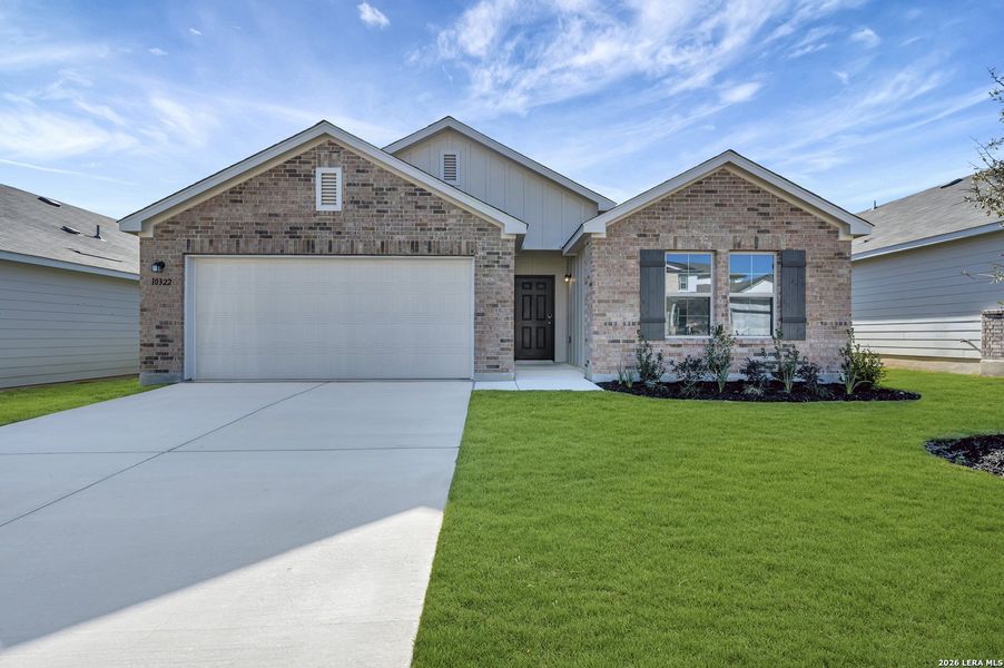 Front exterior of a new home in Winding Brook, San Antonio, TX, highlighting curb appeal (Image 17).