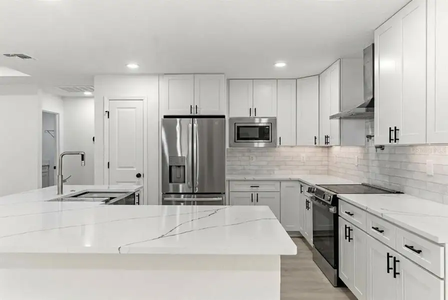 Furnished interior view inside a new home in , Weeki Wachee (Image 13).