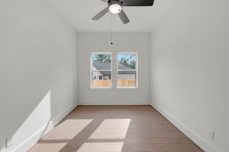 Spacious, unfurnished interior of a new home in The Woodlands Hills - Premier Collection, Willis (Image 16).