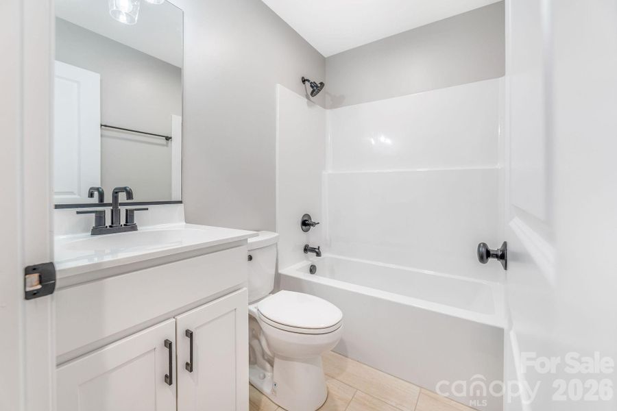 Furnished interior view inside a new home in , Waynesville (Image 8).