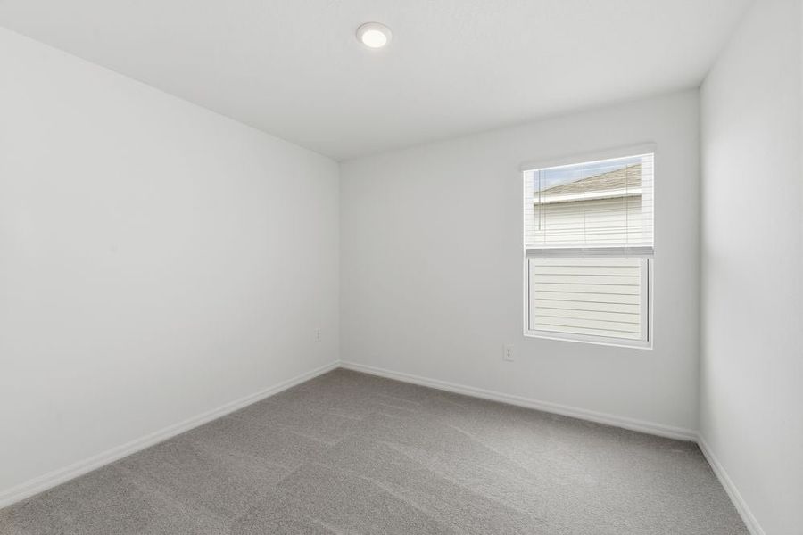 Representative unfurnished interior of a home built from the Redbud by Taylor Morrison in Firethorn, Parrish (Image 13).
