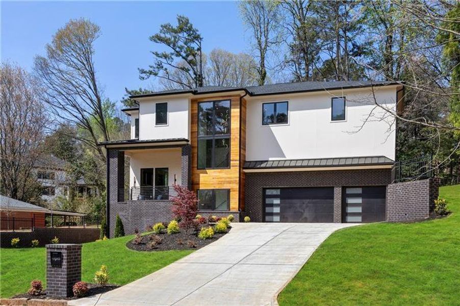 Front exterior of a new home in , Sandy Springs, GA, highlighting curb appeal (Image 2). Front exterior of a new home in , Sandy Springs, GA, highlighting curb appeal (Image 2).