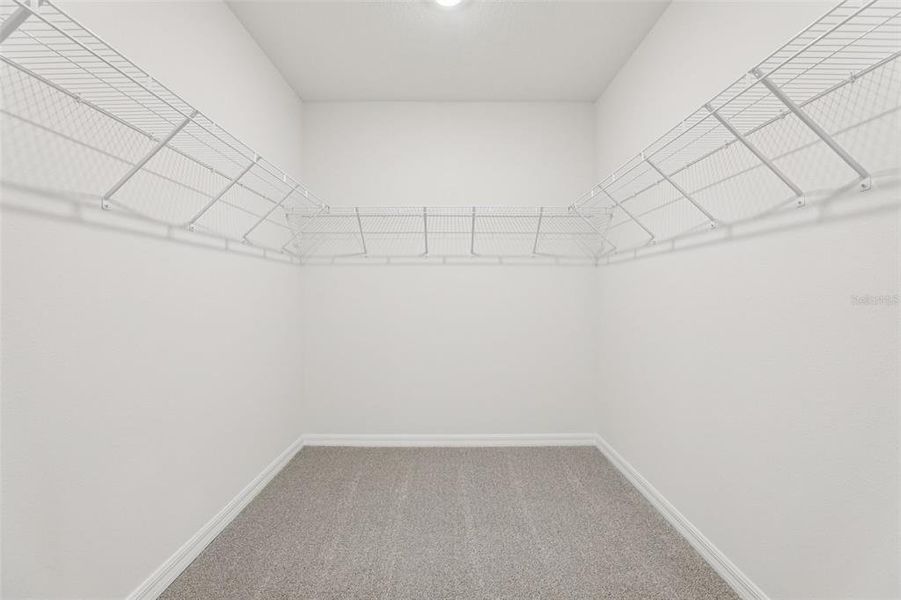 Spacious, unfurnished interior of a new home in Lake Deer Estates - Signature Series, Poinciana (Image 29).