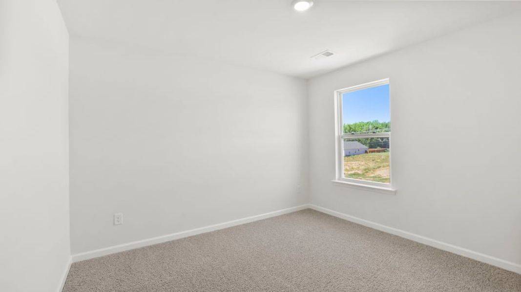 Spacious, unfurnished interior of a new home in Durbin Meadows Traditions, Fountain Inn (Image 28).