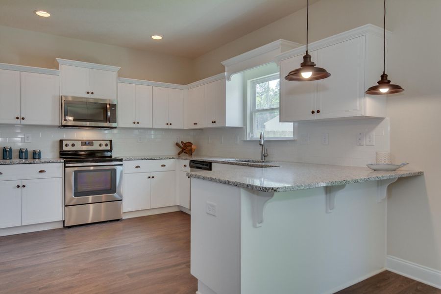 Furnished interior view inside a new home in , Edgefield (Image 7).