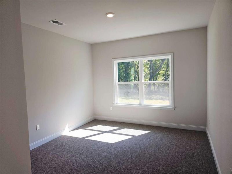 Spacious, unfurnished interior of a new home in Scarlett Place, Bowdon (Image 9).