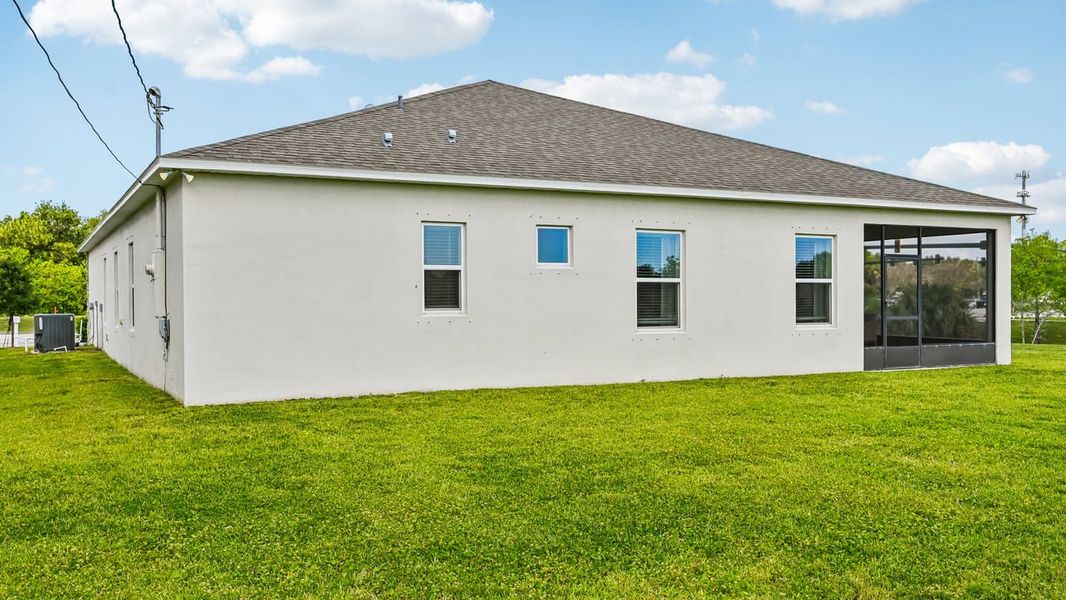 Exterior details and patio area of a home in Vero Lake Estates, Vero Beach (Image 22).
