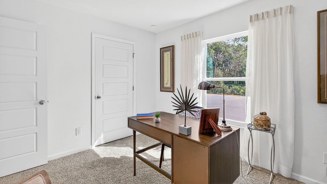 Representative furnished interior of a home built from the Berkeley II by D.R. Horton in Copes Landing, Jacksonville (Image 20).