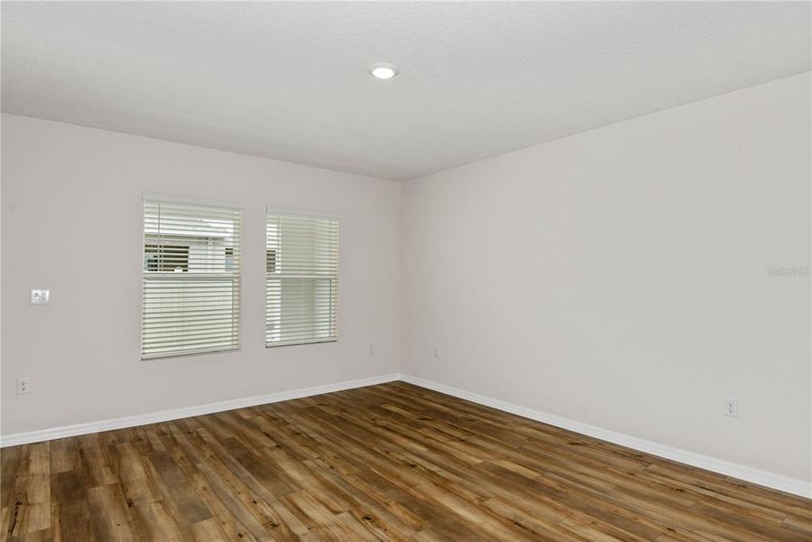 Spacious, unfurnished interior of a new home in Grove at Crosswind, Haines City (Image 18).