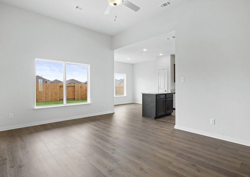 The family room has large windows that let in great, natural light.