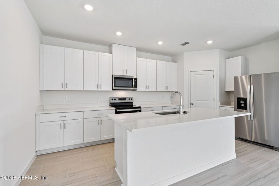 Furnished interior view inside a new home in Flagler Village - Signature Series, Palm Coast (Image 6).
