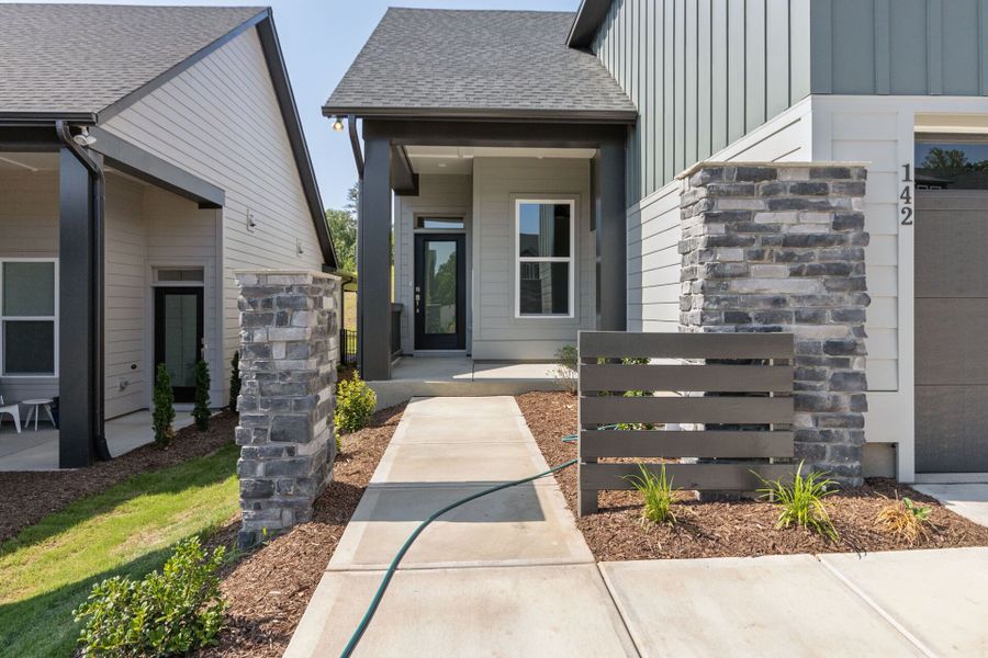 Exterior details and patio area of a home in Encore at Chatham Park – Villa Series, Pittsboro (Image 21). Exterior details and patio area of a home in Encore at Chatham Park – Villa Series, Pittsboro (Image 21).