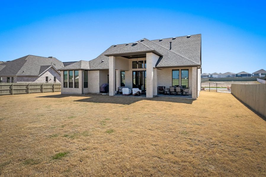 Exterior details and patio area of a home in Santa Rita Ranch, Liberty Hill (Image 25). Exterior details and patio area of a home in Santa Rita Ranch, Liberty Hill (Image 25).