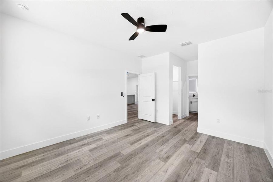 Spacious, unfurnished interior of a new home in , Port Charlotte (Image 24).