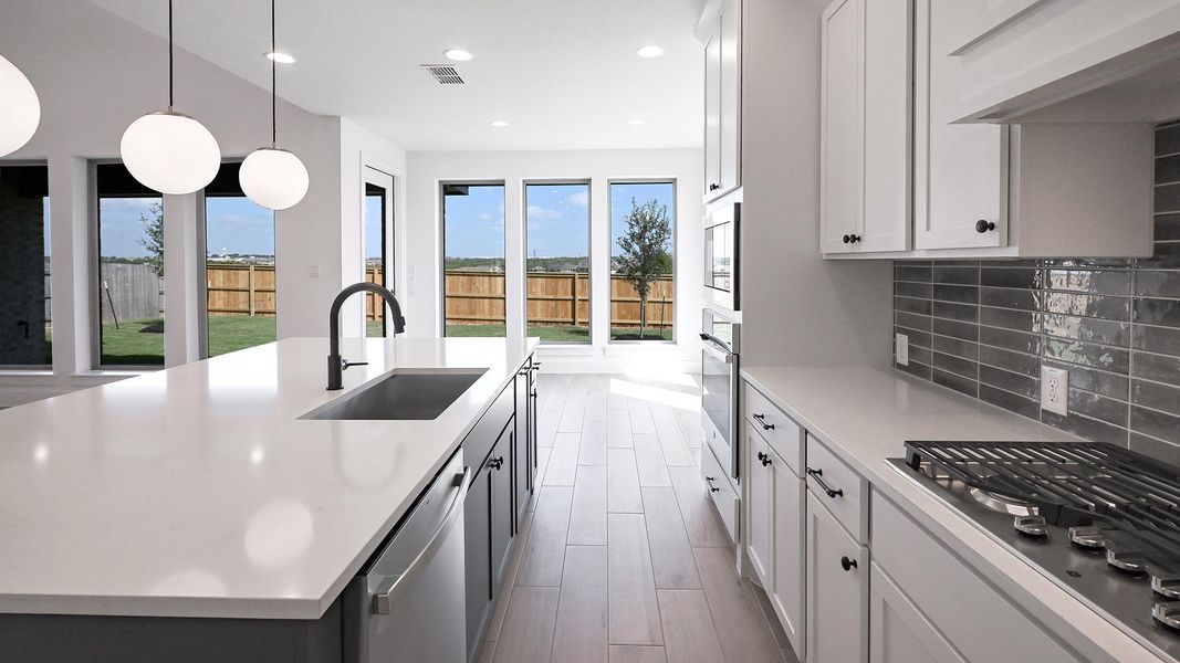 Furnished interior view inside a new home in Crosswinds, Kyle (Image 9).