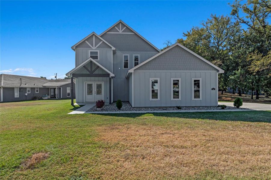 Front exterior of a new home in , Tool, TX, highlighting curb appeal (Image 1). Front exterior of a new home in , Tool, TX, highlighting curb appeal (Image 1).