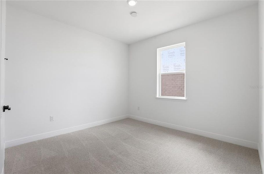 Spacious, unfurnished interior of a new home in Vintner Reserve, Clermont (Image 18).