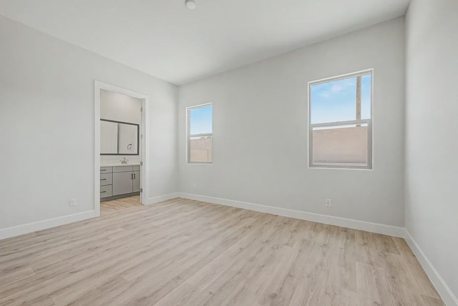 Spacious, unfurnished interior of a new home in Bellero Estates, Queen Creek (Image 15). Spacious, unfurnished interior of a new home in Bellero Estates, Queen Creek (Image 15).