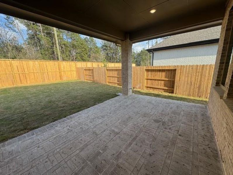 Exterior details and patio area of a home in Evergreen, Conroe (Image 4).