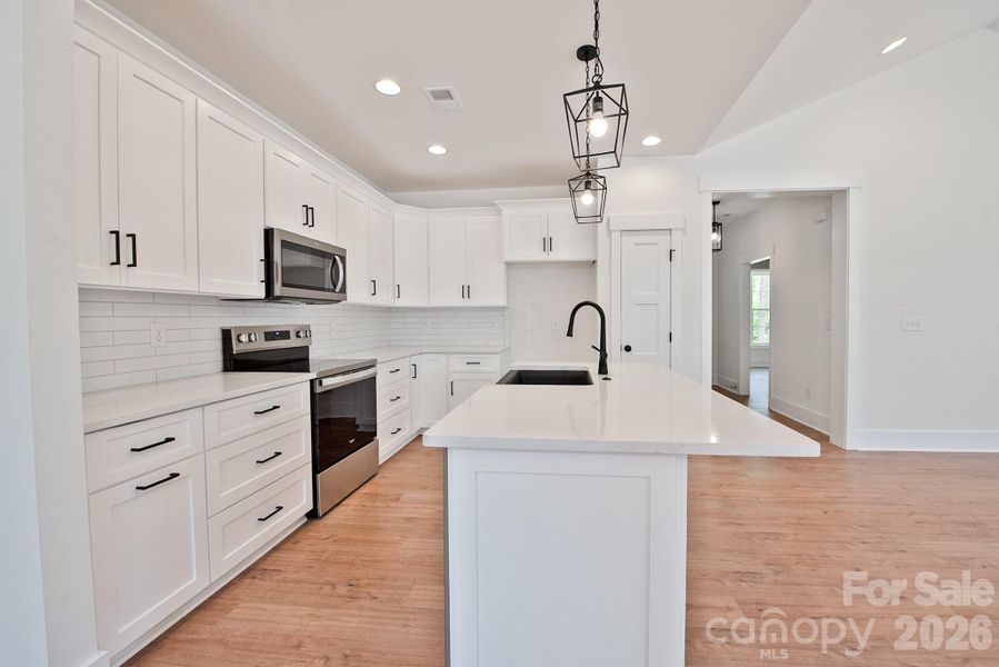 Furnished interior view inside a new home in , Concord (Image 5).