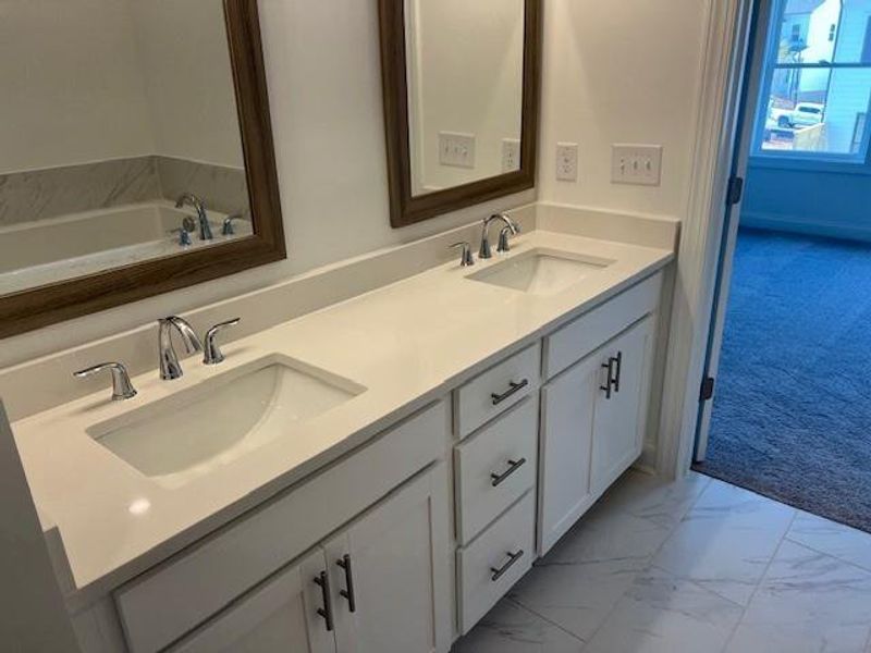 Furnished interior view inside a new home in Palisades Townhomes, Cumming (Image 7). Furnished interior view inside a new home in Palisades Townhomes, Cumming (Image 7).