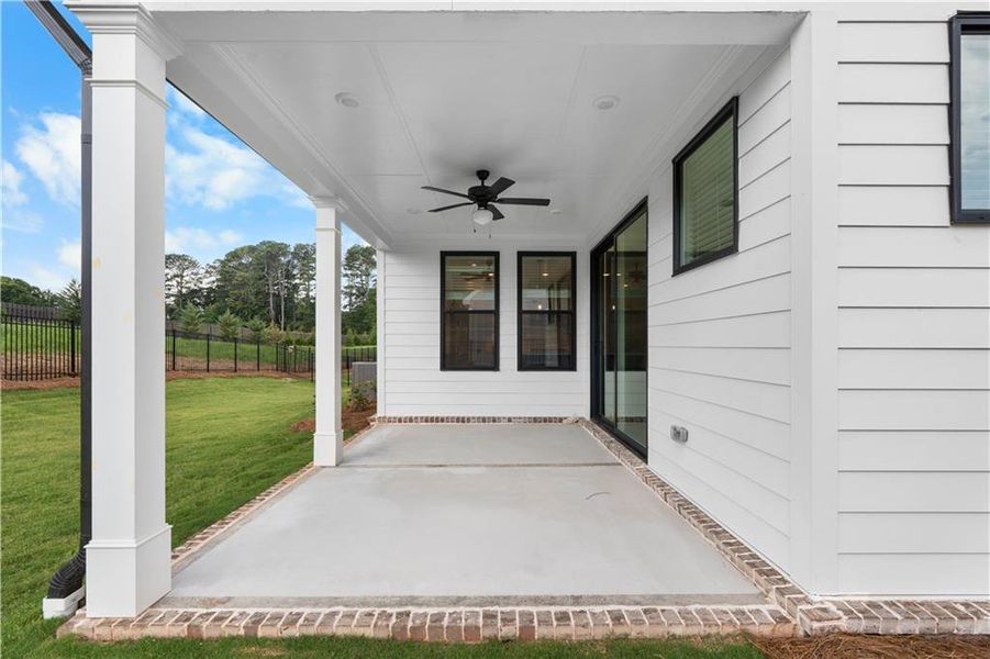 Exterior details and patio area of a home in Promenade at Sawnee Village, Cumming (Image 3).