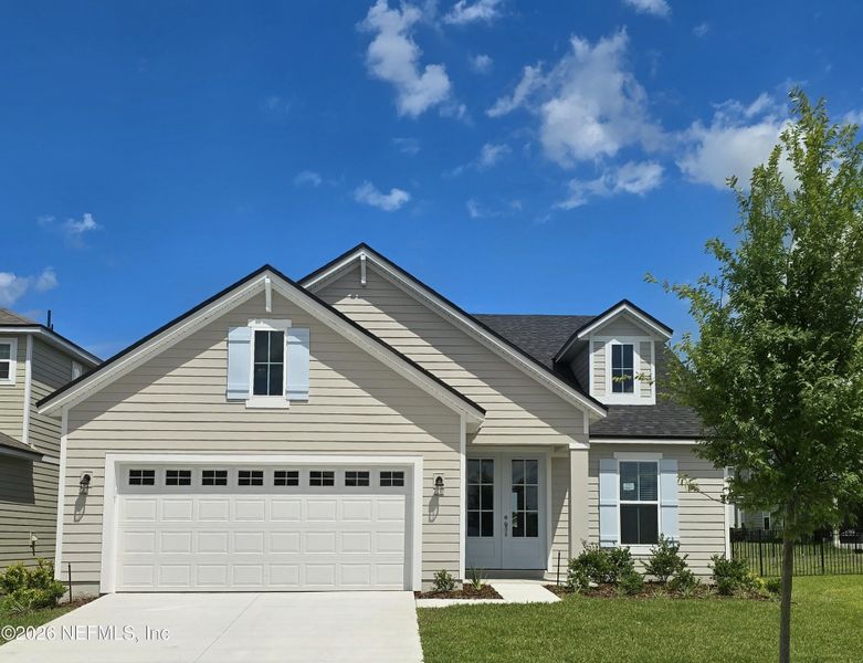 Front exterior of a new home in Hyland Trail, Green Cove Springs, FL, highlighting curb appeal (Image 16).