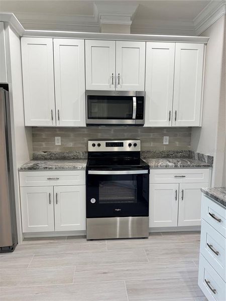 Furnished interior view inside a new home in , Englewood (Image 30).