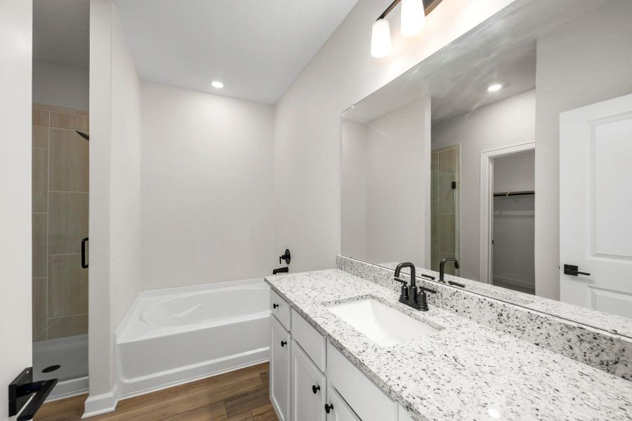 Furnished interior view inside a new home in Sunterra, Katy (Image 5).