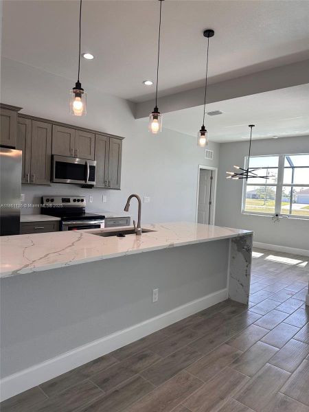 Furnished interior view inside a new home in , Cape Coral (Image 1).
