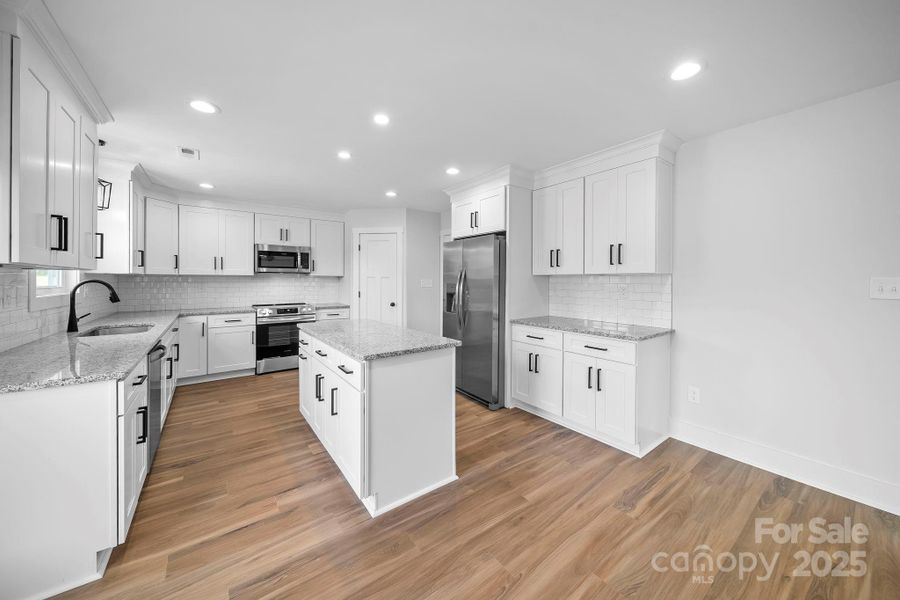 Furnished interior view inside a new home in , Wingate (Image 4).