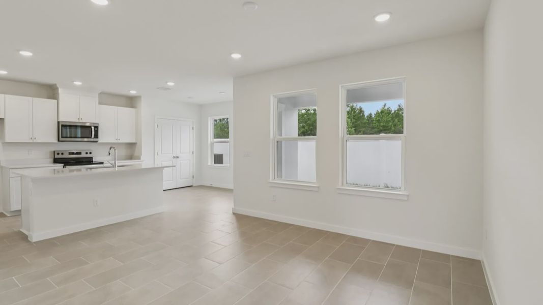 Furnished interior view inside a new home in Cyrene at Harmony, St. Cloud (Image 6).