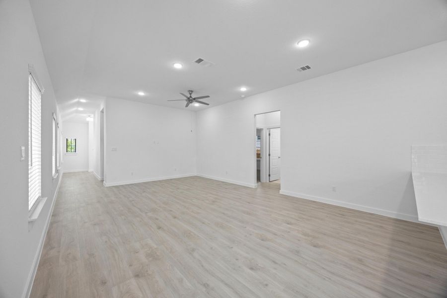 Living Room in the Pecan II home plan by Trophy Signature Homes – REPRESENTATIVE PHOTO