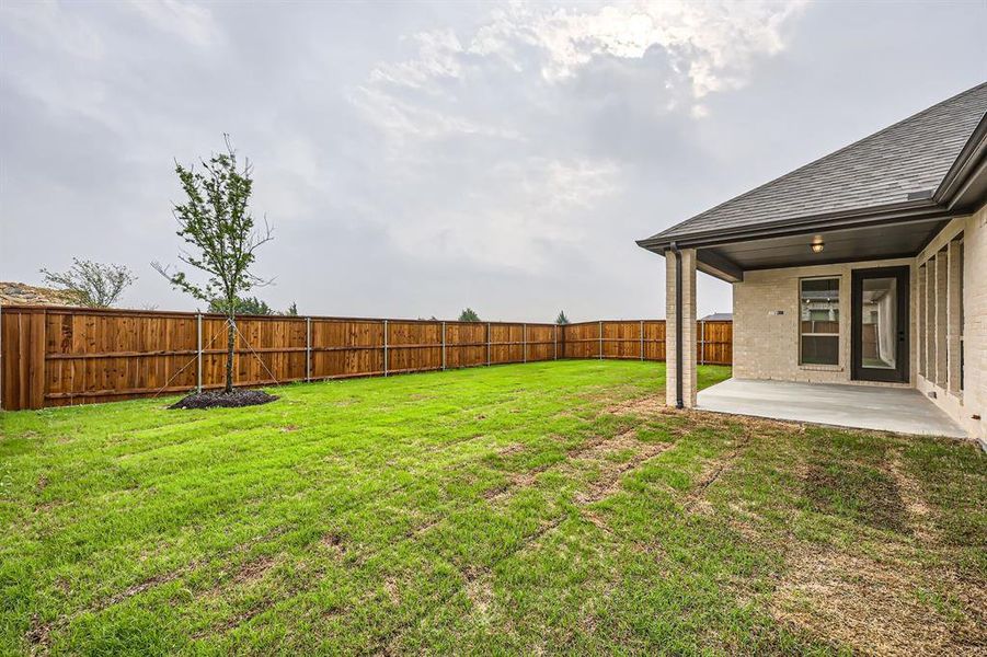 View of yard with a fenced backyard and a patio area View of yard with a fenced backyard and a patio area