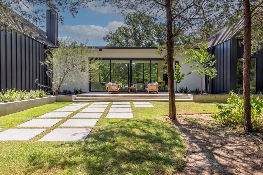 Front exterior of a new home in , College Station, TX, highlighting curb appeal (Image 23).