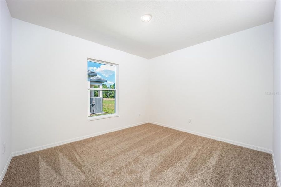 Spacious, unfurnished interior of a new home in Gum Lake Preserve, Lake Alfred (Image 18).