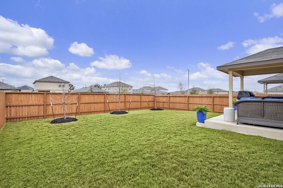 Exterior details and patio area of a home in Langdon, San Antonio (Image 23).