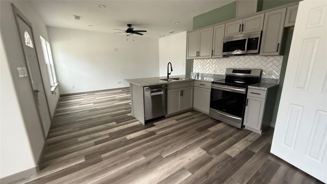 Furnished interior view inside a new home in , Conroe (Image 11).