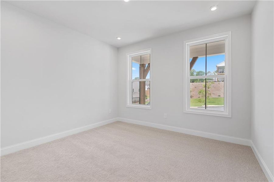 Spacious, unfurnished interior of a new home in Tiberon Woods, Cumming (Image 31).