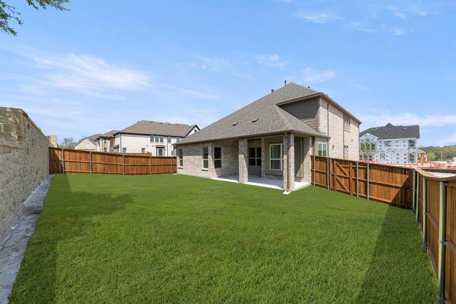 Exterior details and patio area of a home in Providence Cove, McKinney (Image 4).