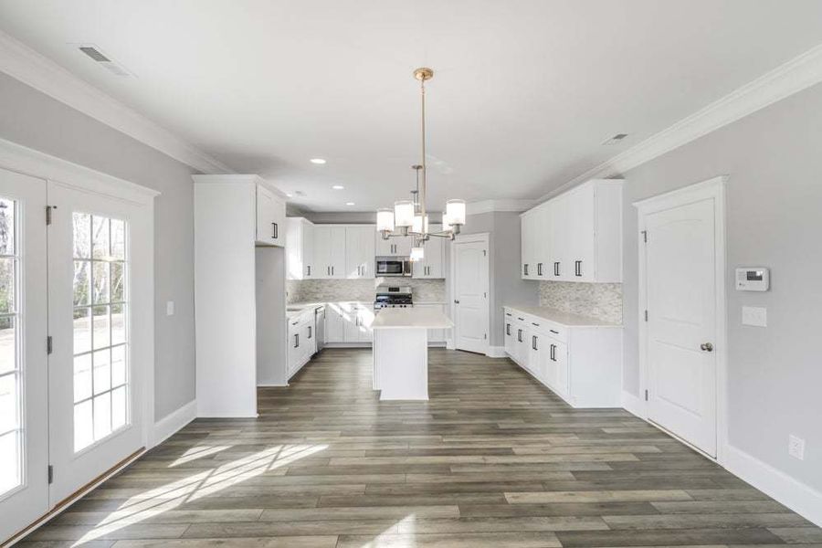 Representative unfurnished interior of a home built from the Drayton by Caviness & Cates Communities in Bartlett Manor, Youngsville (Image 78).