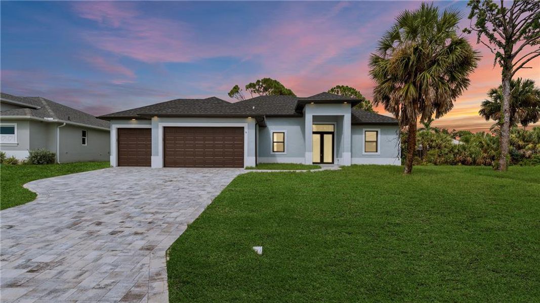 Front exterior of a new home in , Rotonda West, FL, highlighting curb appeal (Image 2).